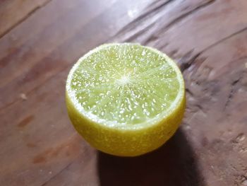 High angle view of lemon in glass on table