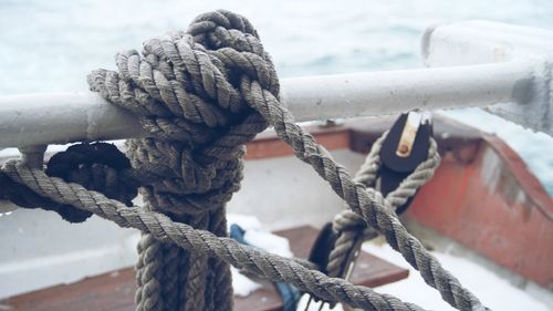 Close-up of rope tied on boat 