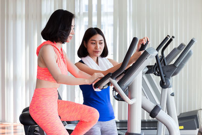 Young women exercising in gym