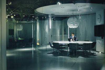 Businessman working in conference room at workplace