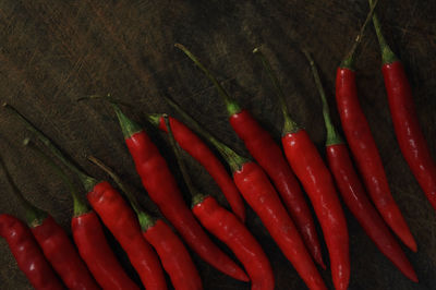 High angle view of chili peppers on table