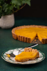 Close-up of cake in plate on table