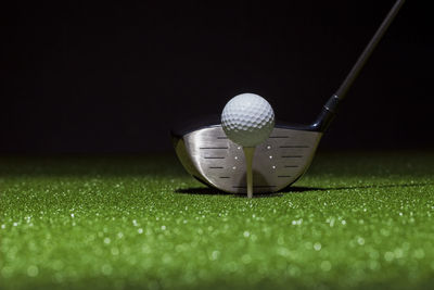 Golf ball on grassy field