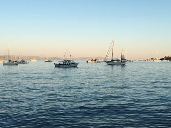 Boats sailing in sea