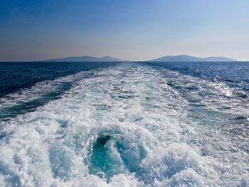 View of seascape against blue sky