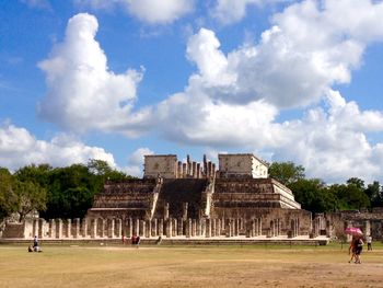 View of historical building against cloudy sky