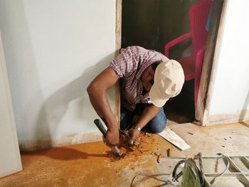 High angle view of man working at home