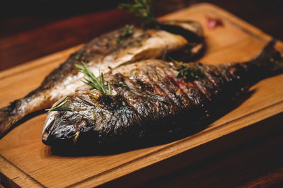 Close-up of dead fish on table