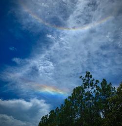 Low angle view of rainbow against sky