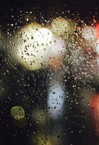 Close-up of water drops on glass