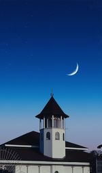 Low angle view of building against sky at night