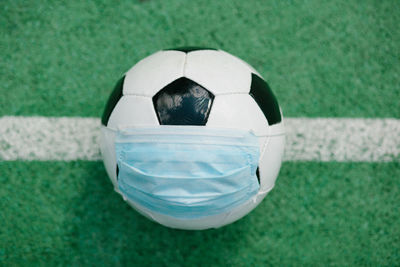 High angle view of soccer ball on field