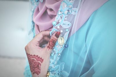 Close-up of woman holding hands