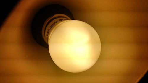 Close-up of illuminated light bulb