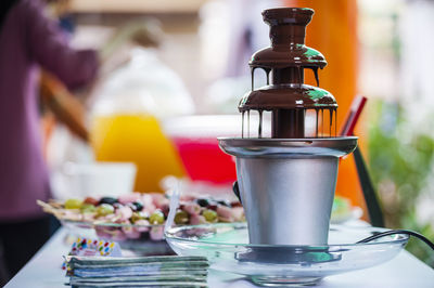 Chocolate fountain on table