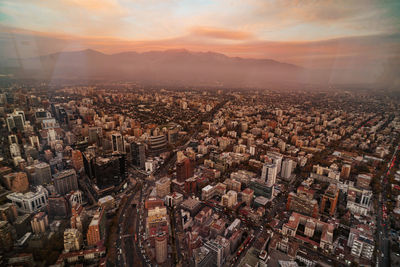 High angle view of townscape against sky during sunset