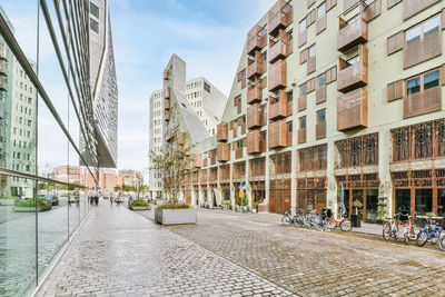 Buildings in city against sky