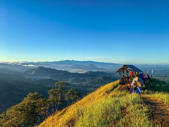 Scenic view of mountains against clear blue sky