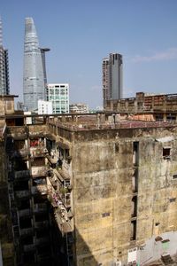 View of buildings in city against sky