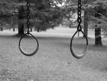 Close-up of swing in park