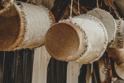 Close-up of container hanging on rope for sale