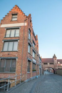 Low angle view of buildings against clear sky