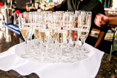 Close-up of wine glasses on table