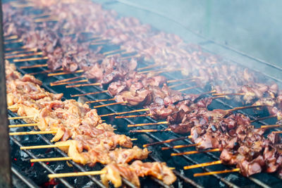 Close-up of meat on barbecue grill