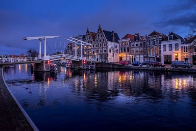 Reflection of illuminated buildings in water at night