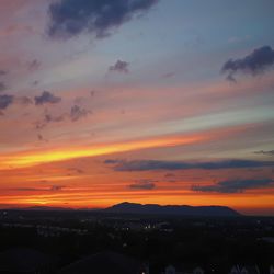 Scenic view of dramatic sky during sunset