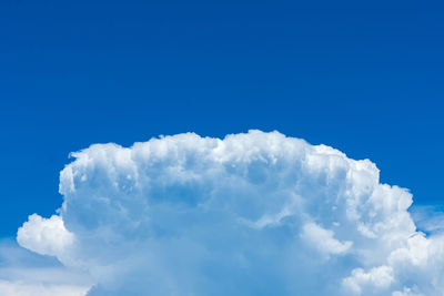 Low angle view of clouds in blue sky