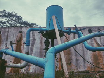 Close-up of pipe against sky