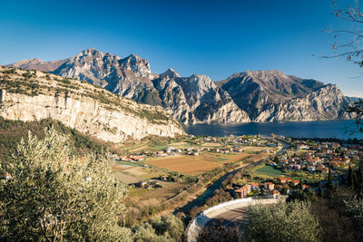 Scenic view of mountains against clear blue sky