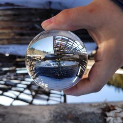 Close-up of hand holding glass