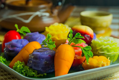 Close-up of fruits served on table