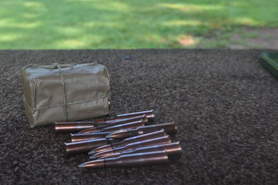 Close-up of bullets on table