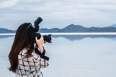 Close-up of woman taking photographs