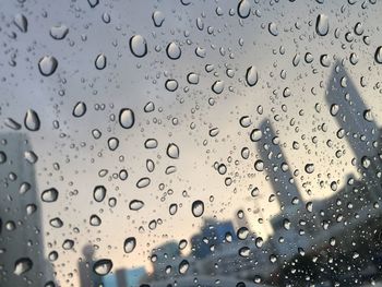 Full frame shot of raindrops on glass window