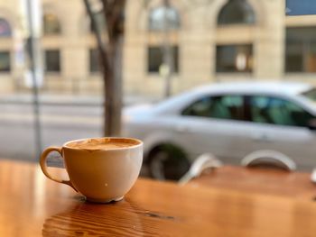 Close-up of coffee served on table