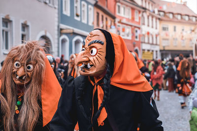 Group of people wearing mask in city