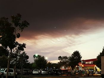 Buildings against sky at dusk