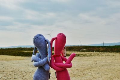 Girl sitting on grassy field