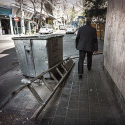 Full length of woman walking in city