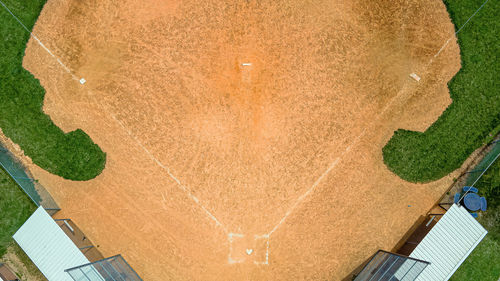 Fresh grass grows in the spring around the baseball fields at a local park.