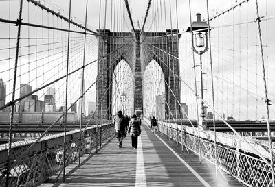 People walking on brooklyn bridge