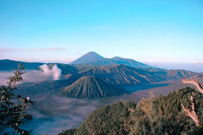 Scenic view of volcanic mountains against sky