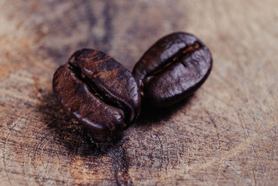 Close-up of coffee beans on table