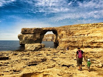 Woman standing on beach