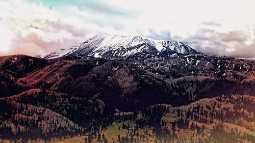 Scenic view of snowcapped mountain against sky