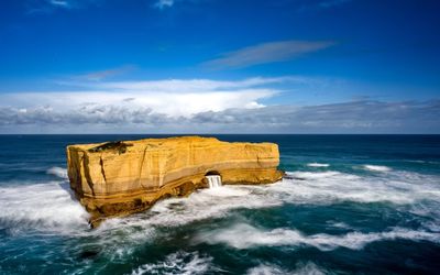 Scenic view of sea against blue sky